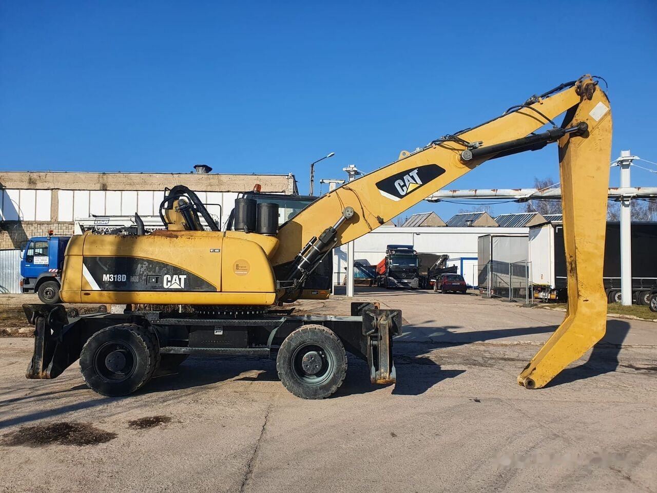 Pelle de manutention Caterpillar 318 D MH: photos 8