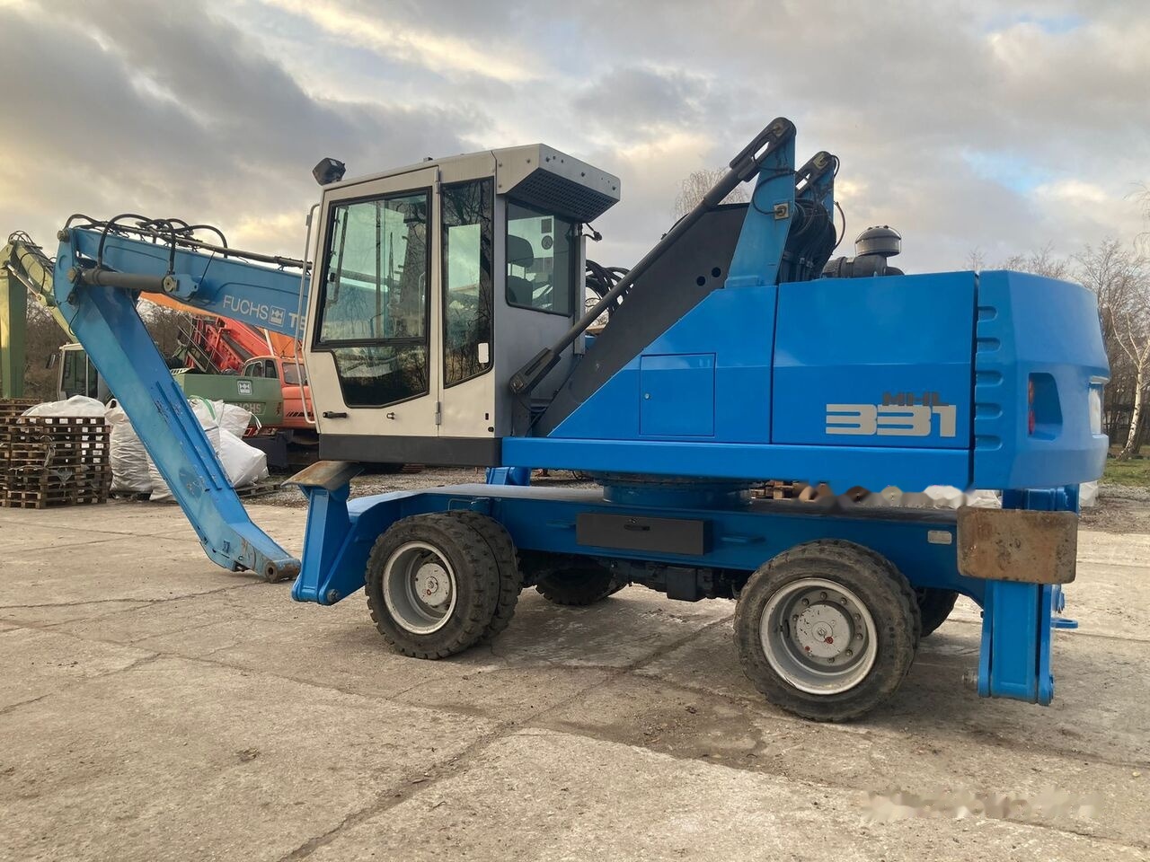 Pelle de manutention Fuchs MHL 331 D Generator: photos 14