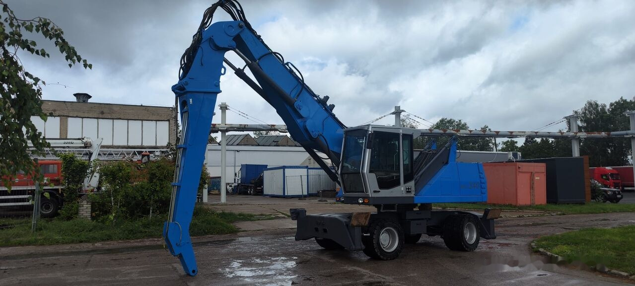 Fuchs MHL 340 D FQC magnet generator - Pelle de manutention: photos 2 Fuchs MHL 340 D FQC magnet generator - Pelle de manutention: photos 2