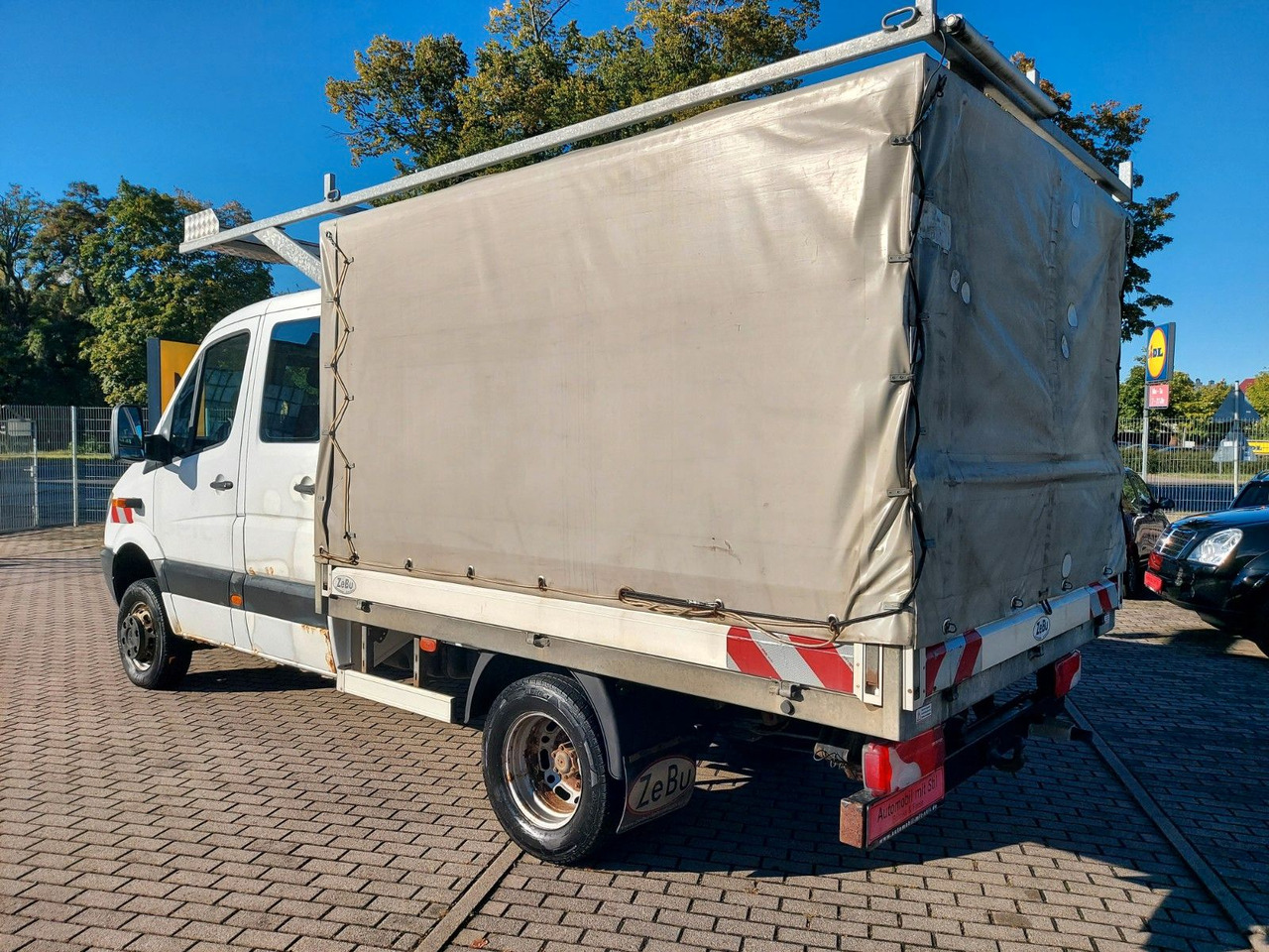 Mercedes-Benz Sprinter II Pritsche DoKa 516 4X4 Plane 6 Sitze - Utilitaire rideaux coulissants (PLSC), Utilitaire double cabine: photos 4 Mercedes-Benz Sprinter II Pritsche DoKa 516 4X4 Plane 6 Sitze - Utilitaire rideaux coulissants (PLSC), Utilitaire double cabine: photos 4