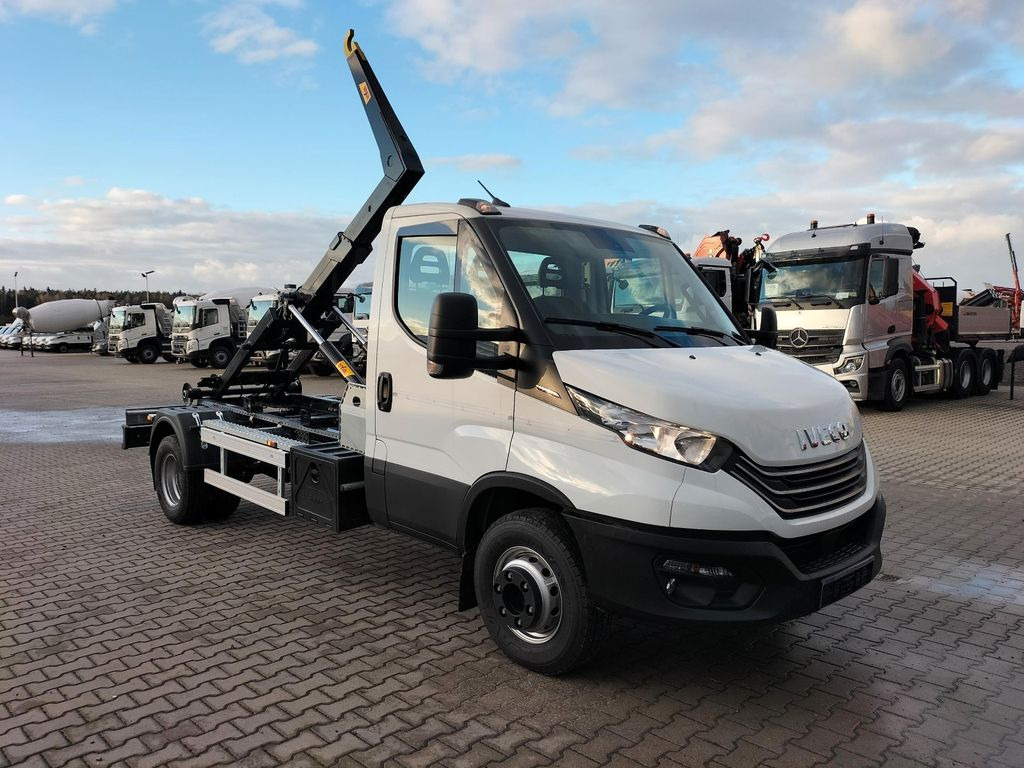 Iveco 70C18H Abrollkipper HYVA HKS-5 - Véhicule utilitaire, Camion ampliroll: photos 1 Iveco 70C18H Abrollkipper HYVA HKS-5 - Véhicule utilitaire, Camion ampliroll: photos 1