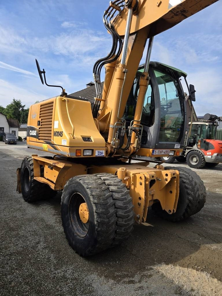 Case WX 145 - Pelle sur pneus: photos 5 Case WX 145 - Pelle sur pneus: photos 5