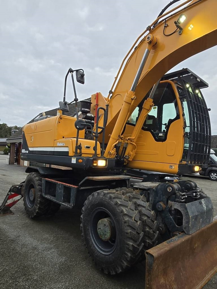 Hyundai R 180W-9A - Pelle sur pneus: photos 5 Hyundai R 180W-9A - Pelle sur pneus: photos 5