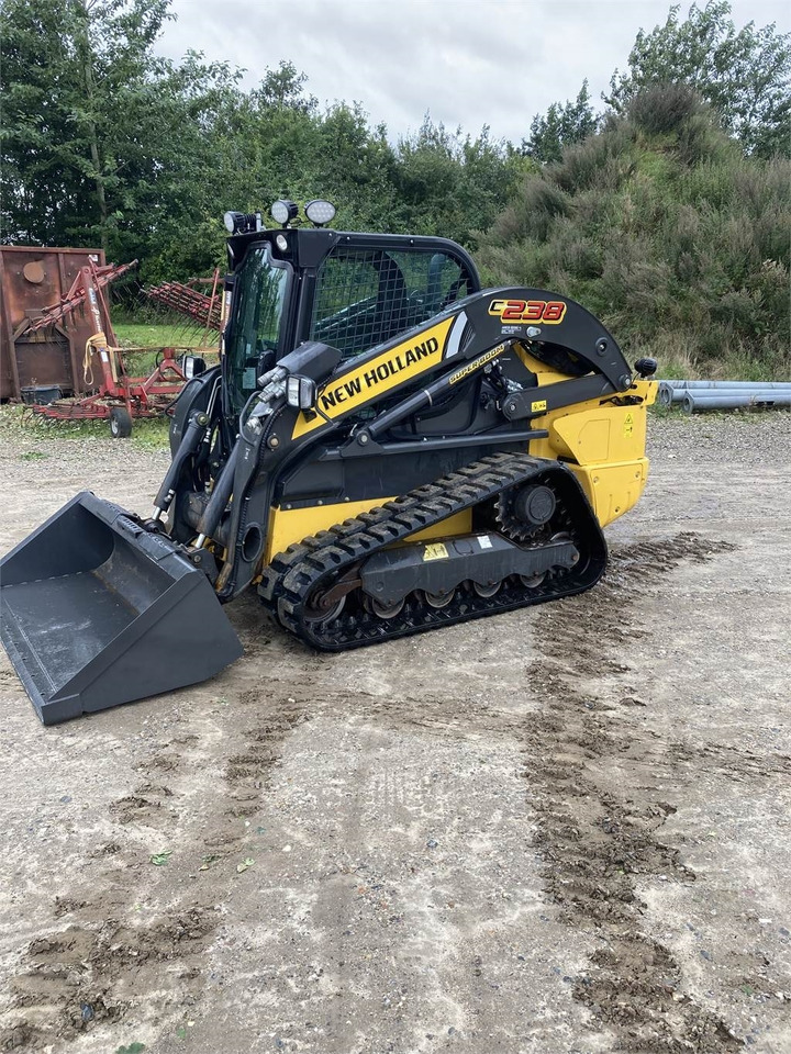 New Holland C 238 LOADER - Chargeuse compacte sur chenilles: photos 3 New Holland C 238 LOADER - Chargeuse compacte sur chenilles: photos 3