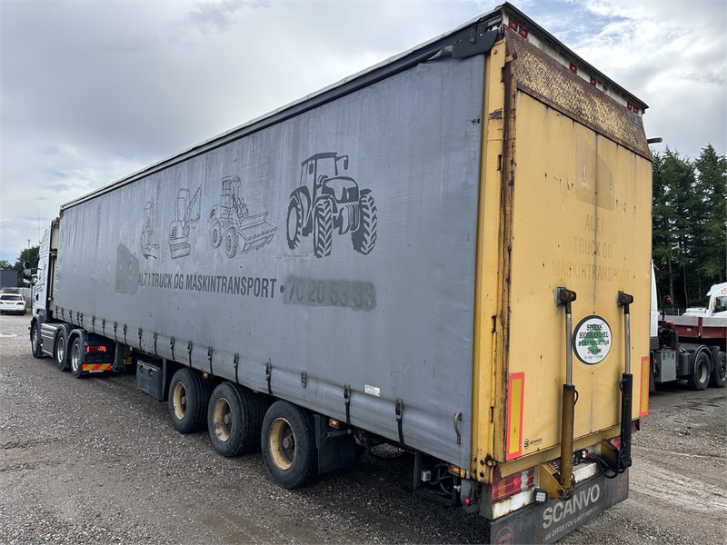 Schmitz Cargobull Machine transport trailer with bag ramp - Semi-remorque surbaissé: photos 2 Schmitz Cargobull Machine transport trailer with bag ramp - Semi-remorque surbaissé: photos 2