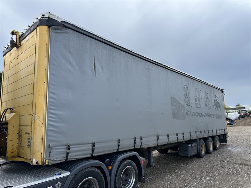 Schmitz Cargobull Machine transport trailer with bag ramp - Semi-remorque: photos 4 Schmitz Cargobull Machine transport trailer with bag ramp - Semi-remorque: photos 4