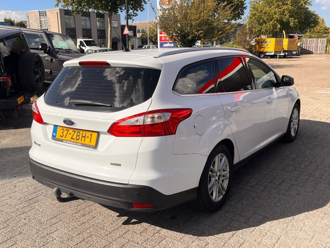 Ford Focus Wagon 1.0 EcoBoost Titanium | 2012 | 164.662 km | 37ZBH1 | NAP: Logisch - Voiture: photos 4 Ford Focus Wagon 1.0 EcoBoost Titanium | 2012 | 164.662 km | 37ZBH1 | NAP: Logisch - Voiture: photos 4
