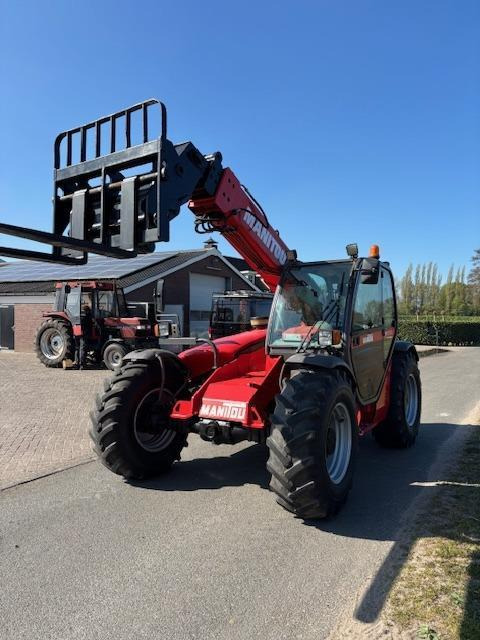 Manitou MT-932 TDL-11-N - Chariot télescopique: photos 1 Manitou MT-932 TDL-11-N - Chariot télescopique: photos 1