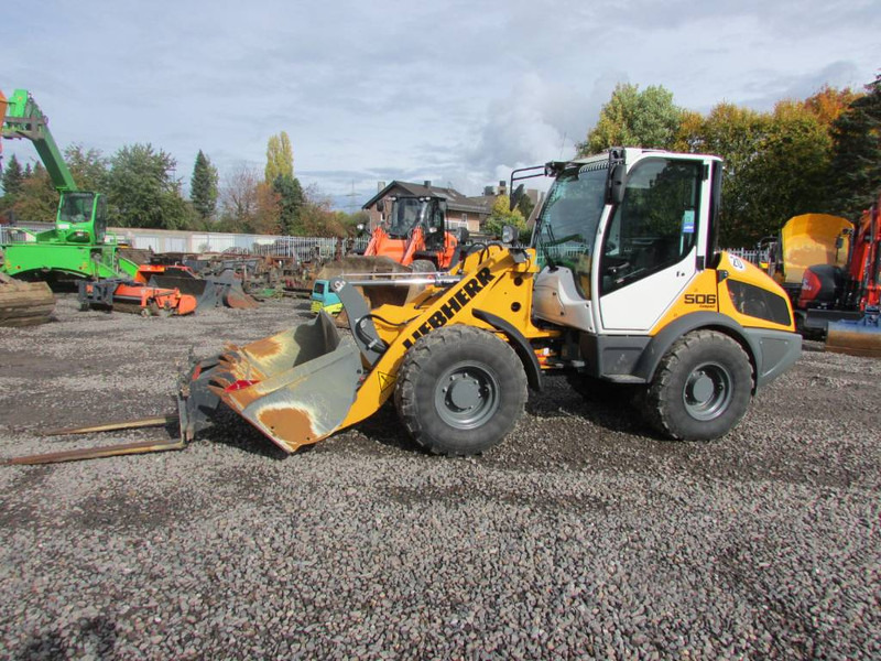 Liebherr L 506 Compact Radlader 46.500 EUR netto L506C - Chargeuse sur pneus: photos 2 Liebherr L 506 Compact Radlader 46.500 EUR netto L506C - Chargeuse sur pneus: photos 2