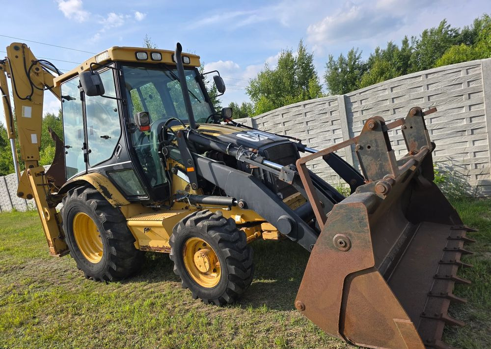 Caterpillar - Tractopelle: photos 3 Caterpillar - Tractopelle: photos 3