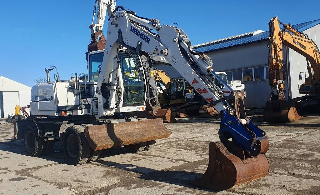 Liebherr A 309 Litronic - Pelle sur pneus: photos 5 Liebherr A 309 Litronic - Pelle sur pneus: photos 5