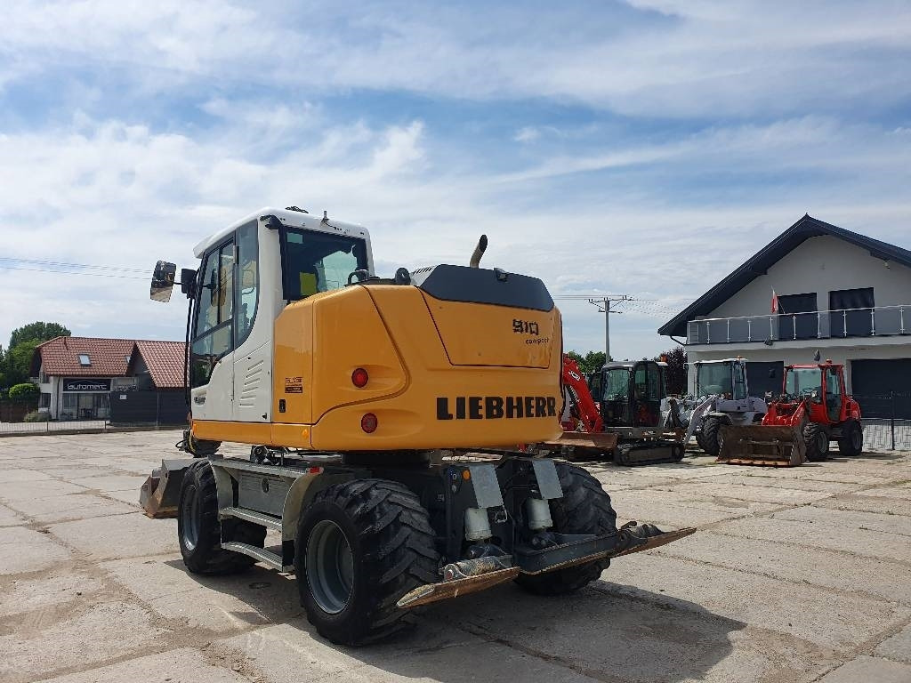 Liebherr A 910 Compact - Pelle sur pneus: photos 3 Liebherr A 910 Compact - Pelle sur pneus: photos 3