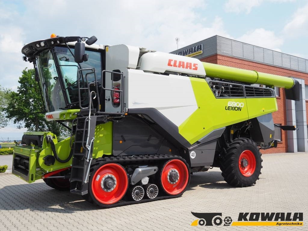 Claas Lexion 6900 TT + V930 - Moissonneuse-batteuse: photos 1 Claas Lexion 6900 TT + V930 - Moissonneuse-batteuse: photos 1