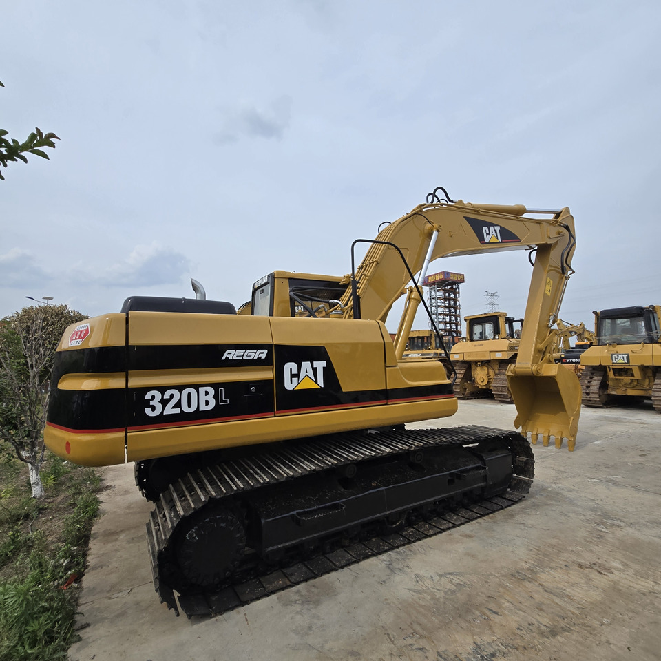 CATERPILLAR 320BL - Pelle sur chenille: photos 4 CATERPILLAR 320BL - Pelle sur chenille: photos 4