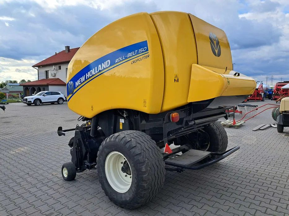 New Holland roll-belt 150 cropcutter - Presse à balles rondes: photos 3 New Holland roll-belt 150 cropcutter - Presse à balles rondes: photos 3