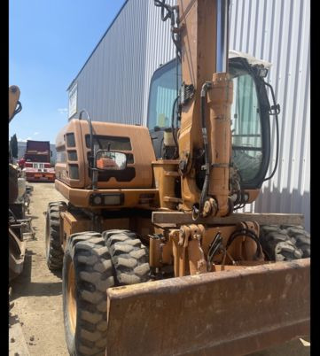 Case WX125 - Pelle sur pneus: photos 2 Case WX125 - Pelle sur pneus: photos 2
