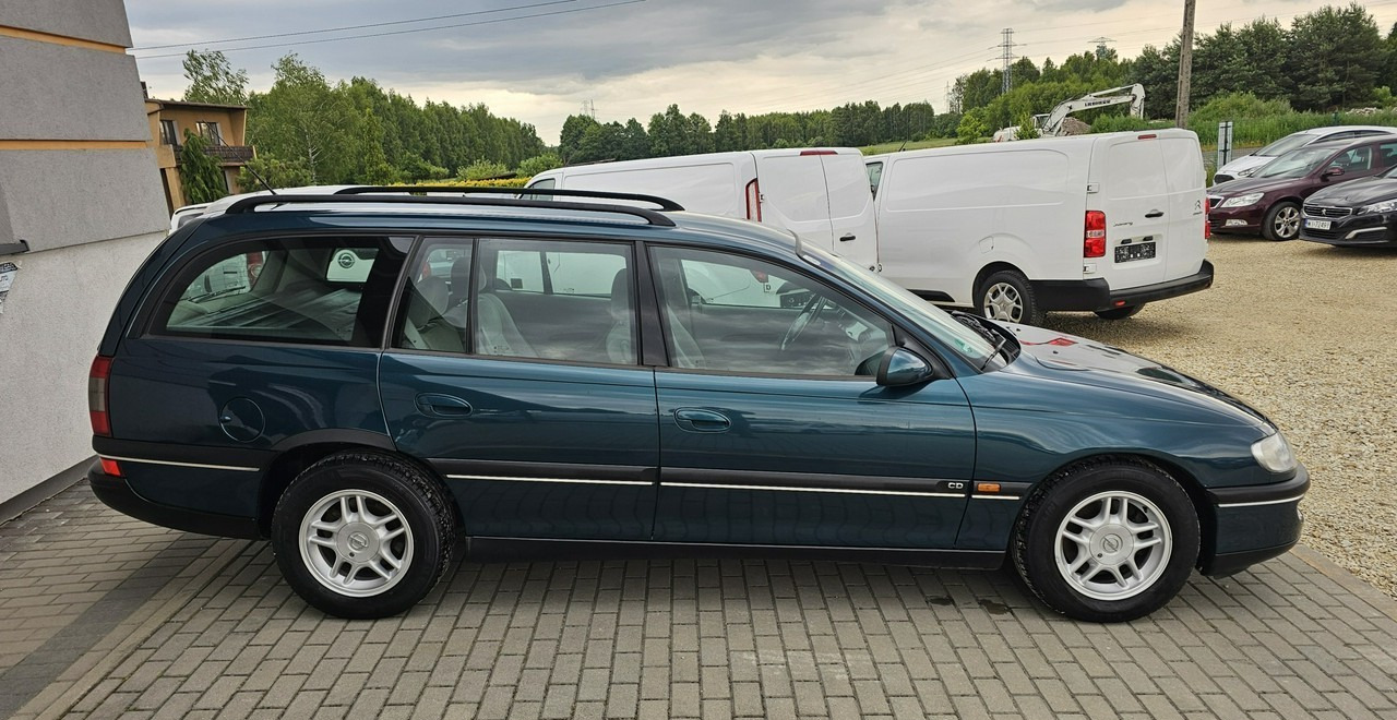 Opel Omega B 2,5 v6 *automat* napęd tył *welury* - Voiture: photos 5 Opel Omega B 2,5 v6 *automat* napęd tył *welury* - Voiture: photos 5