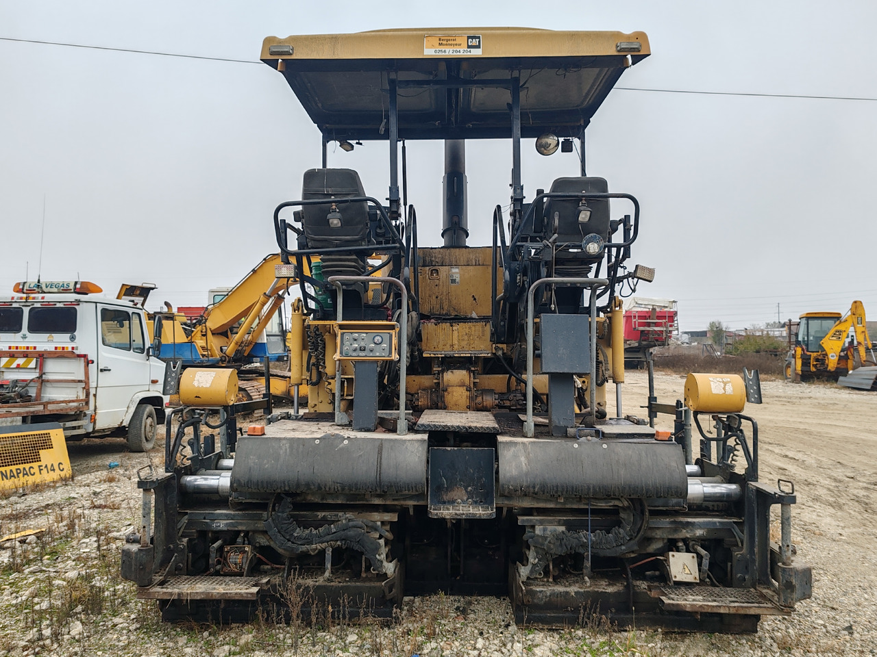 Caterpillar AP555E - Répandeuse: photos 2 Caterpillar AP555E - Répandeuse: photos 2