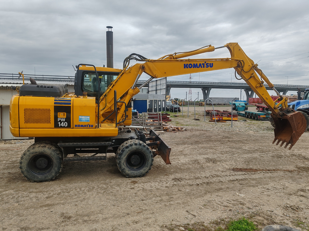 Komatsu PW140-7 - Pelle sur pneus: photos 4 Komatsu PW140-7 - Pelle sur pneus: photos 4