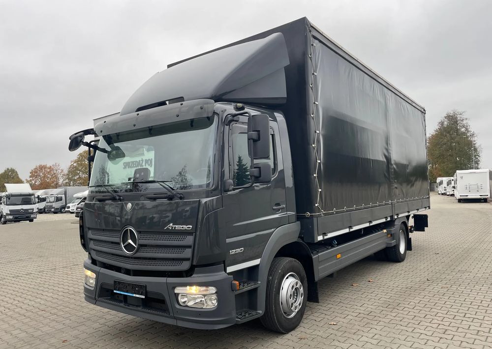 Mercedes-Benz ATEGO 1230 - Camion à rideaux coulissants: photos 2 Mercedes-Benz ATEGO 1230 - Camion à rideaux coulissants: photos 2