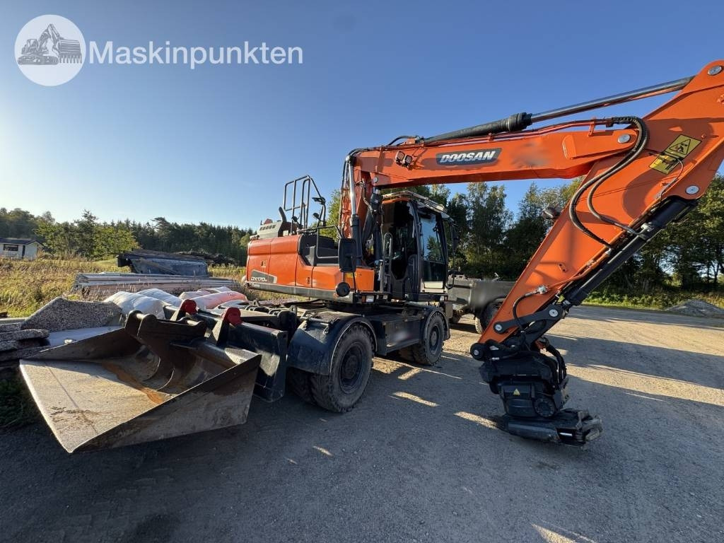Doosan DX 170 W-5 + Tippvagn + Redskap - Pelle sur pneus: photos 1 Doosan DX 170 W-5 + Tippvagn + Redskap - Pelle sur pneus: photos 1
