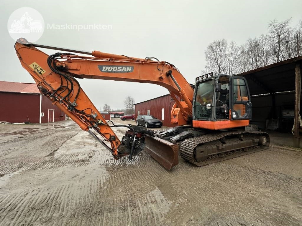 Doosan DX 235 LCR - Pelle sur chenille: photos 1 Doosan DX 235 LCR - Pelle sur chenille: photos 1