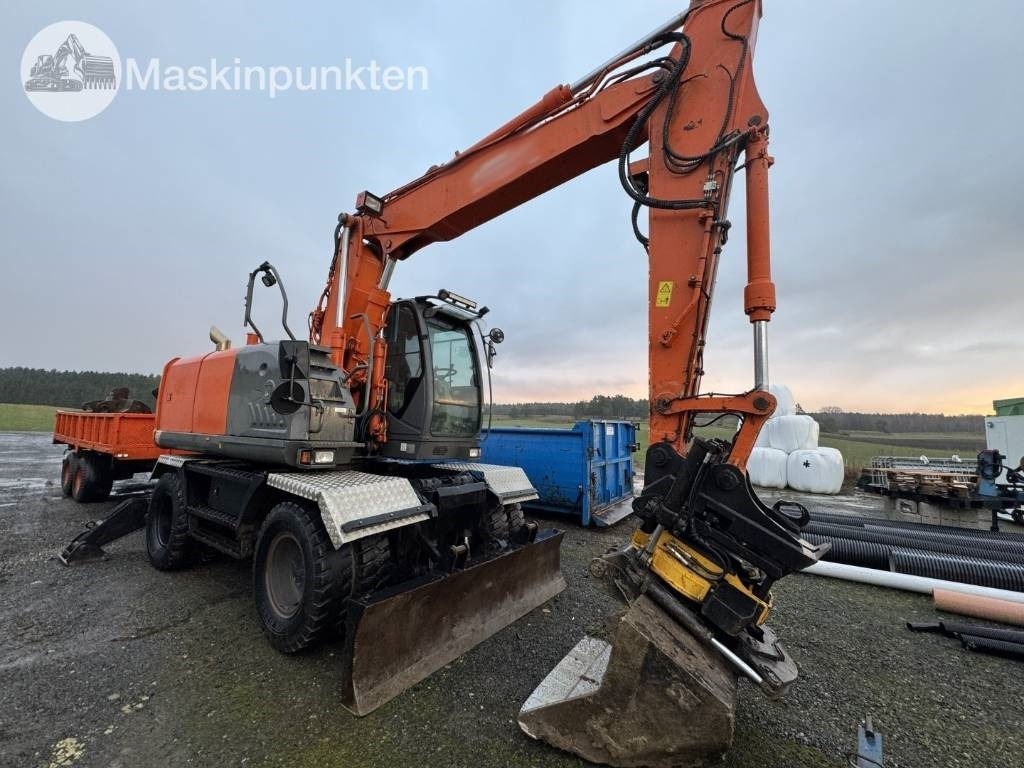 Hitachi ZX 140 W-3 Med vagn och redskap! - Pelle sur pneus: photos 4 Hitachi ZX 140 W-3 Med vagn och redskap! - Pelle sur pneus: photos 4