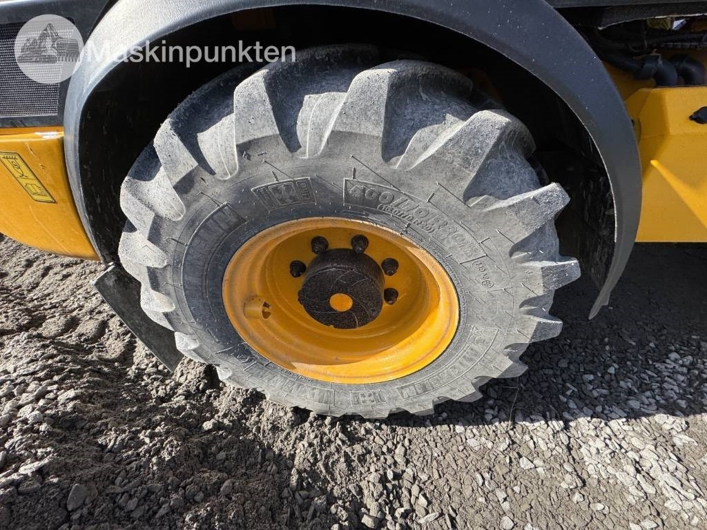 Chargeuse sur pneus JCB 409: photos 25