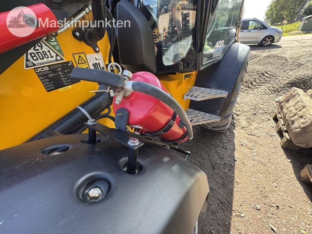 Chargeuse sur pneus JCB 409: photos 43
