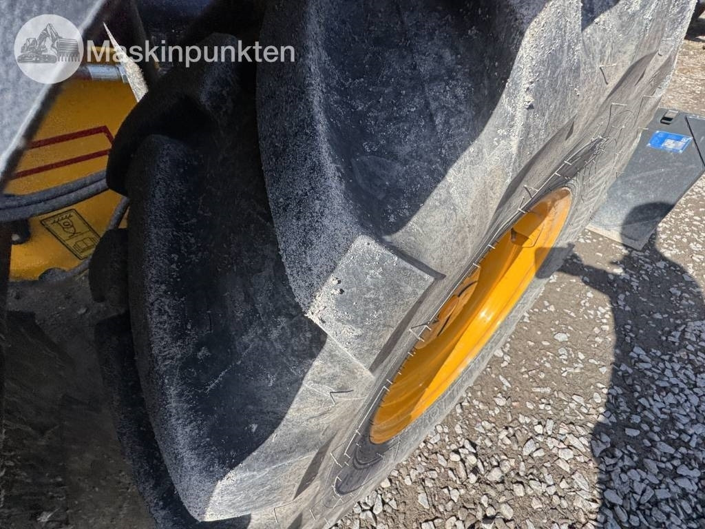 Chargeuse sur pneus JCB 409: photos 34