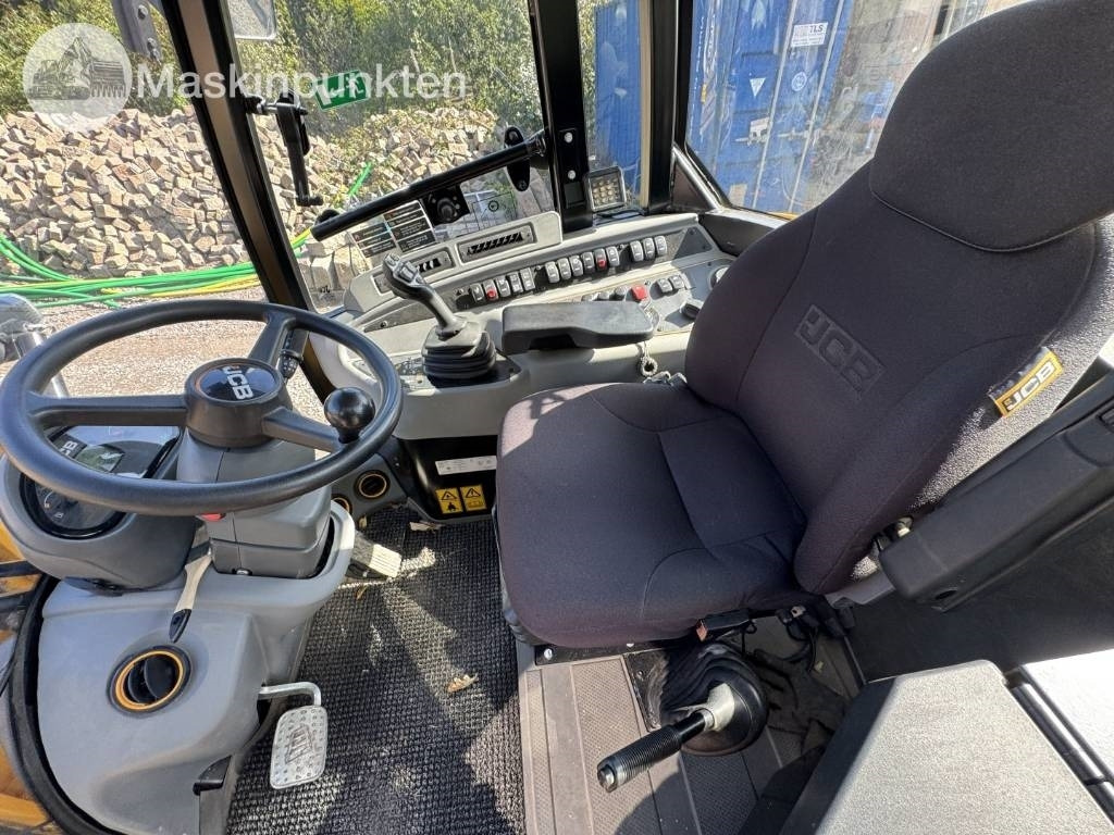 Chargeuse sur pneus JCB 409: photos 50