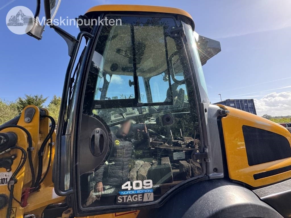 Chargeuse sur pneus JCB 409: photos 45