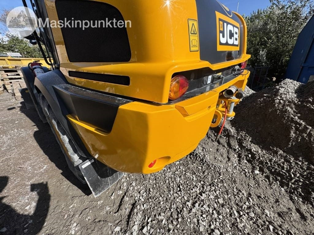 Chargeuse sur pneus JCB 409: photos 21