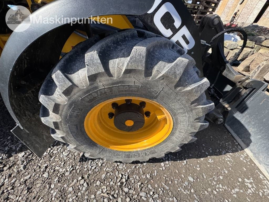 Chargeuse sur pneus JCB 409: photos 35