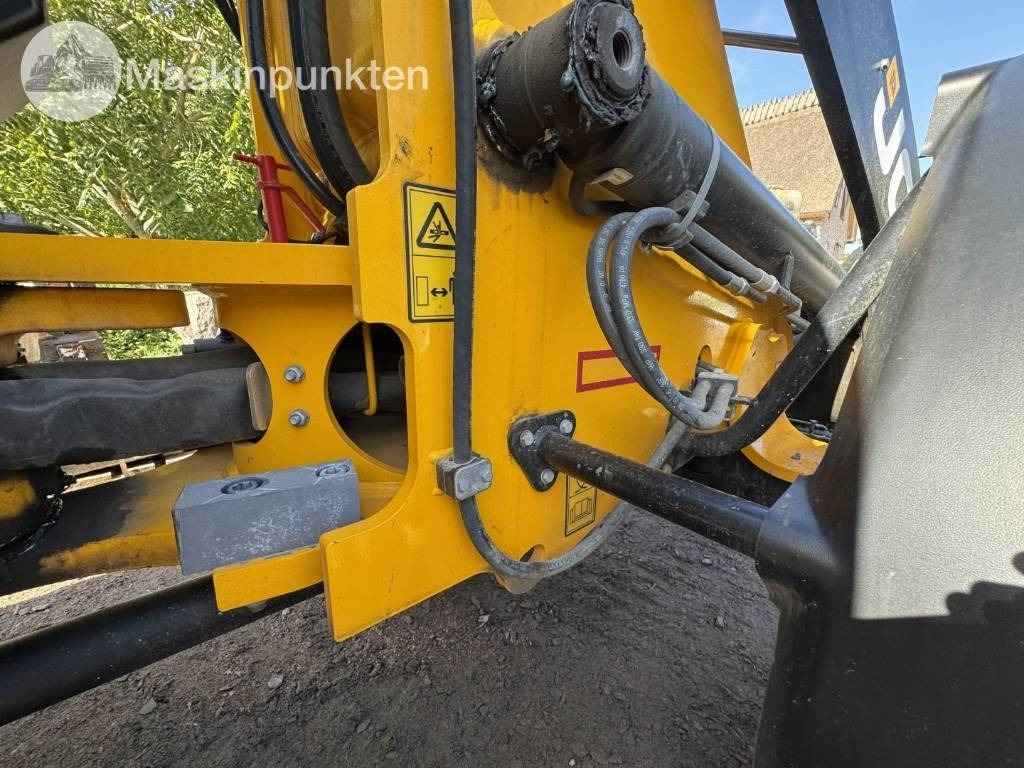 Chargeuse sur pneus JCB 409: photos 33