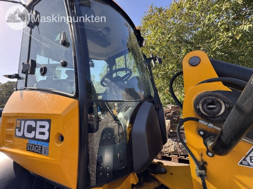 Chargeuse sur pneus JCB 409: photos 48