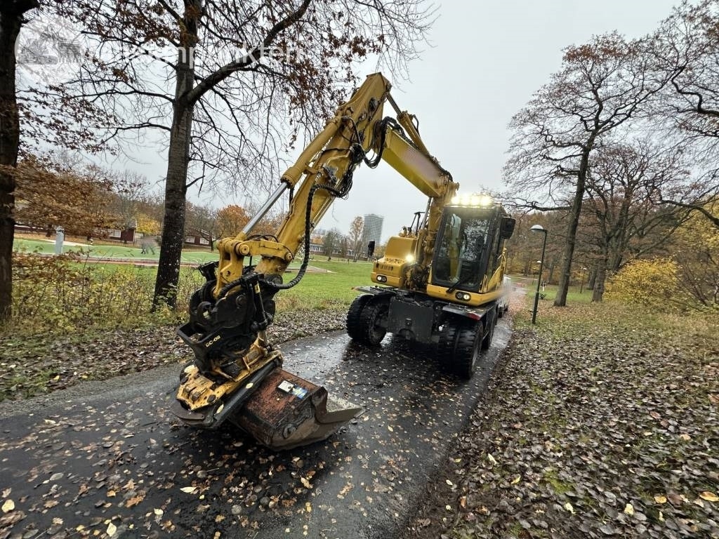 Komatsu PW 148-11 med vagn och redskap - Pelle sur pneus: photos 2 Komatsu PW 148-11 med vagn och redskap - Pelle sur pneus: photos 2