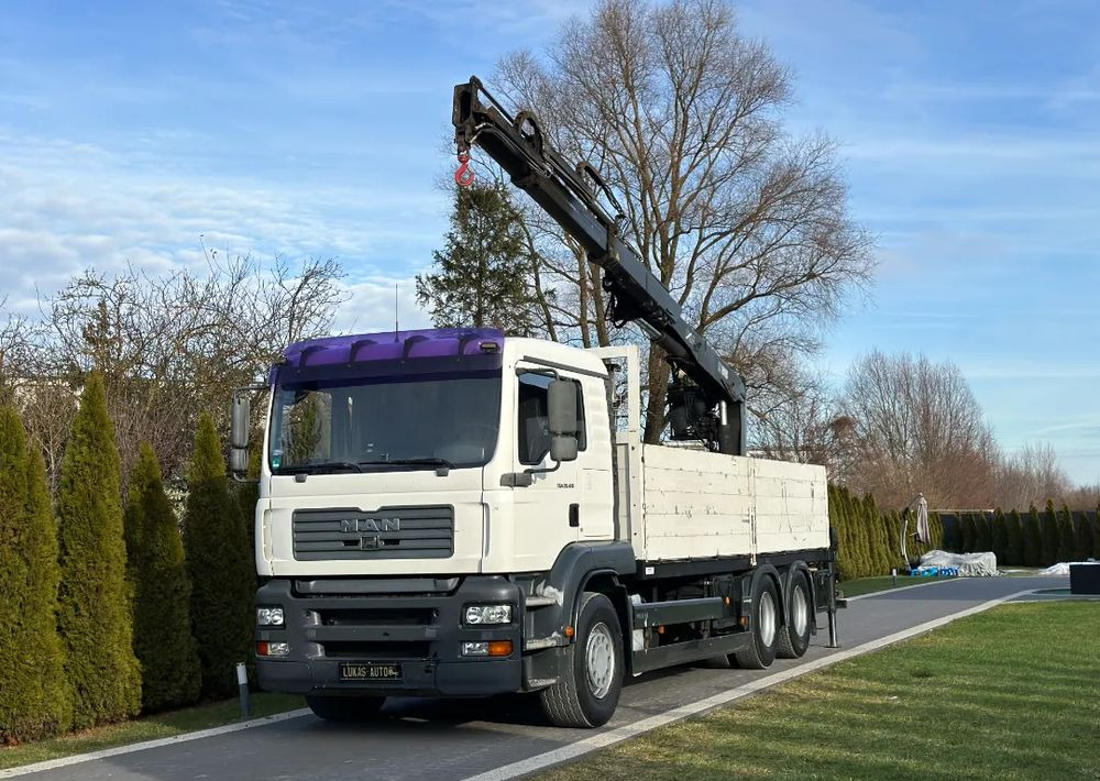 MAN TGA 24.410 6x4 HIAB MANUAL - Camion grue, Camion plateau: photos 1 MAN TGA 24.410 6x4 HIAB MANUAL - Camion grue, Camion plateau: photos 1