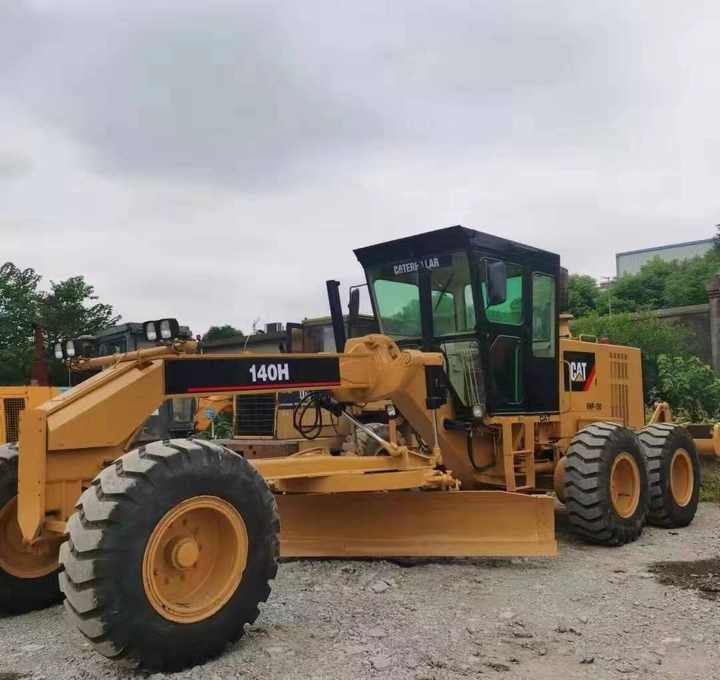 Used CAT 140H Motor Grader From Japan with Excellent Performance Caterpillar 140h in Good Condition for Sale - Niveleuse: photos 1 Used CAT 140H Motor Grader From Japan with Excellent Performance Caterpillar 140h in Good Condition for Sale - Niveleuse: photos 1