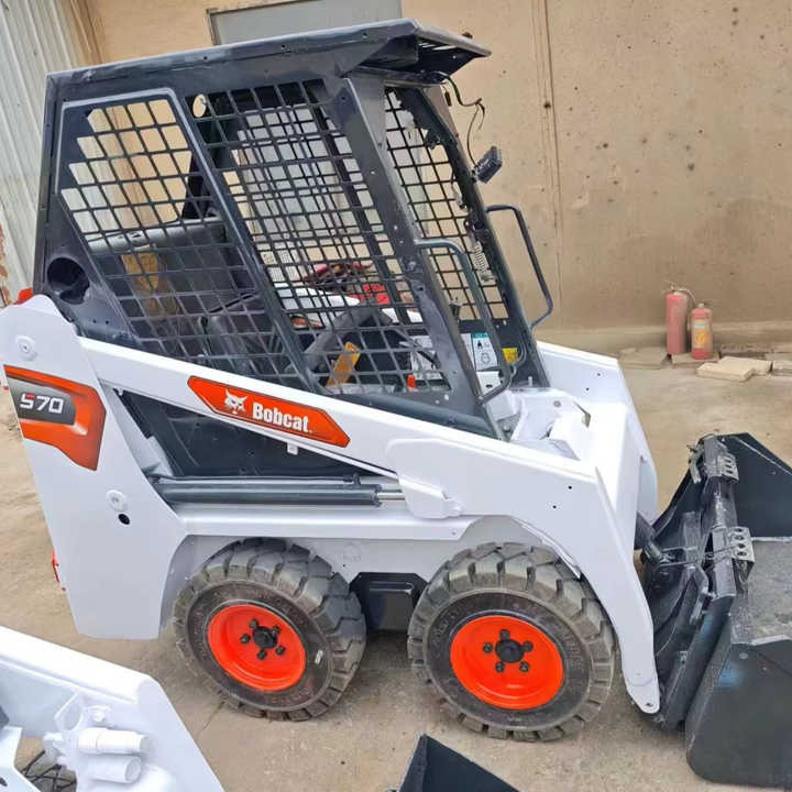 Second Hand Bobcat S70 Skid Steer Loader on Stock Excellent Performance Bobcat S70 S160 S300 330 Skid Steer for Sale - Mini chargeuse: photos 1 Second Hand Bobcat S70 Skid Steer Loader on Stock Excellent Performance Bobcat S70 S160 S300 330 Skid Steer for Sale - Mini chargeuse: photos 1