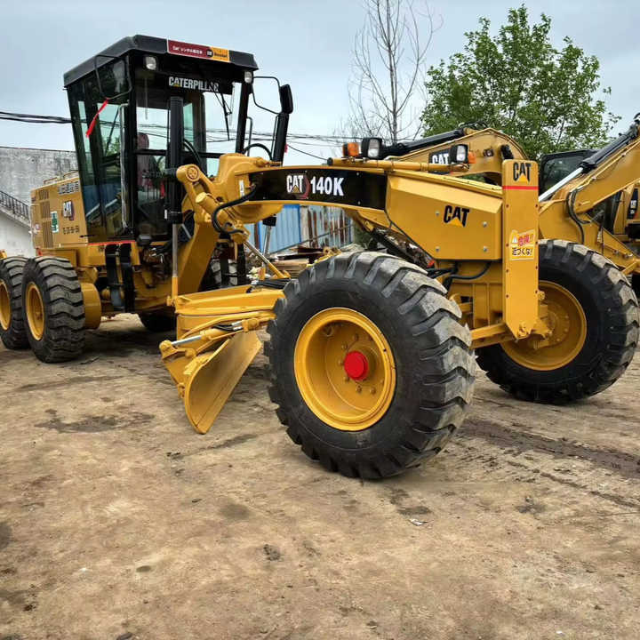 Used Cat 140K New Model Grader Popular Brand Japan Cat Hydraulic Machinery Construction Equipment - Niveleuse: photos 1 Used Cat 140K New Model Grader Popular Brand Japan Cat Hydraulic Machinery Construction Equipment - Niveleuse: photos 1