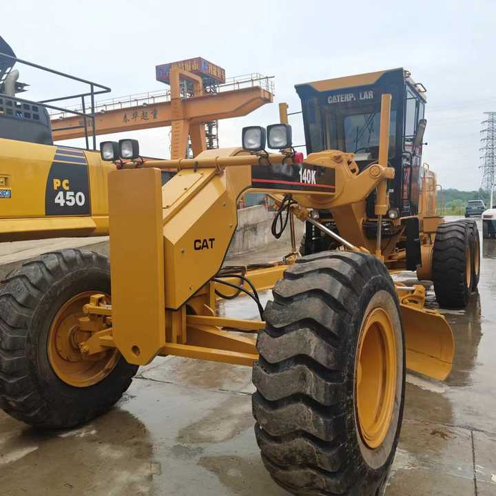 Used Cat 140K New Model Grader Popular Brand Japan Cat Hydraulic Machinery Construction Equipment - Niveleuse: photos 1 Used Cat 140K New Model Grader Popular Brand Japan Cat Hydraulic Machinery Construction Equipment - Niveleuse: photos 1