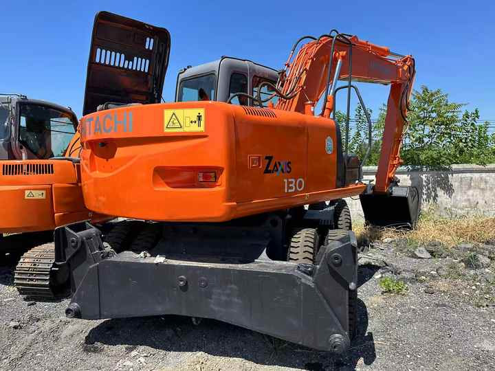 Used Wheel Excavator Hitachi ZX 130W Made in Japan 13tonHitachi Zx130w Wheel Excavator Price Used Hitachi Zx130 Excavator SALE - Pelle sur pneus: photos 2 Used Wheel Excavator Hitachi ZX 130W Made in Japan 13tonHitachi Zx130w Wheel Excavator Price Used Hitachi Zx130 Excavator SALE - Pelle sur pneus: photos 2