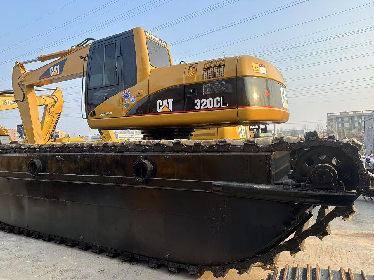 CATERPILLAR 320C Amphibious excavator - Excavatrice amphibie: photos 1 CATERPILLAR 320C Amphibious excavator - Excavatrice amphibie: photos 1