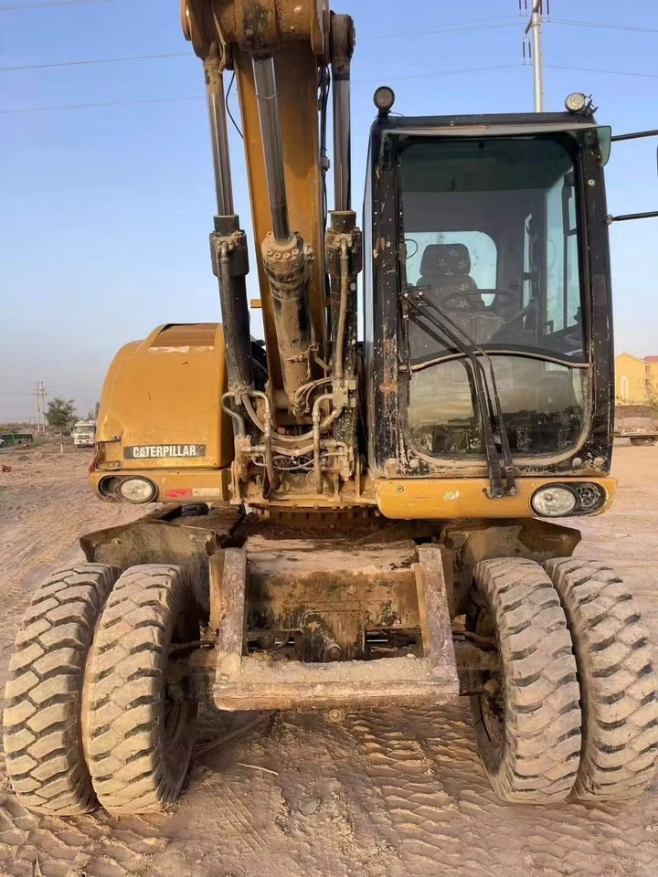 CATERPILLAR M315 - Pelle sur pneus: photos 3 CATERPILLAR M315 - Pelle sur pneus: photos 3