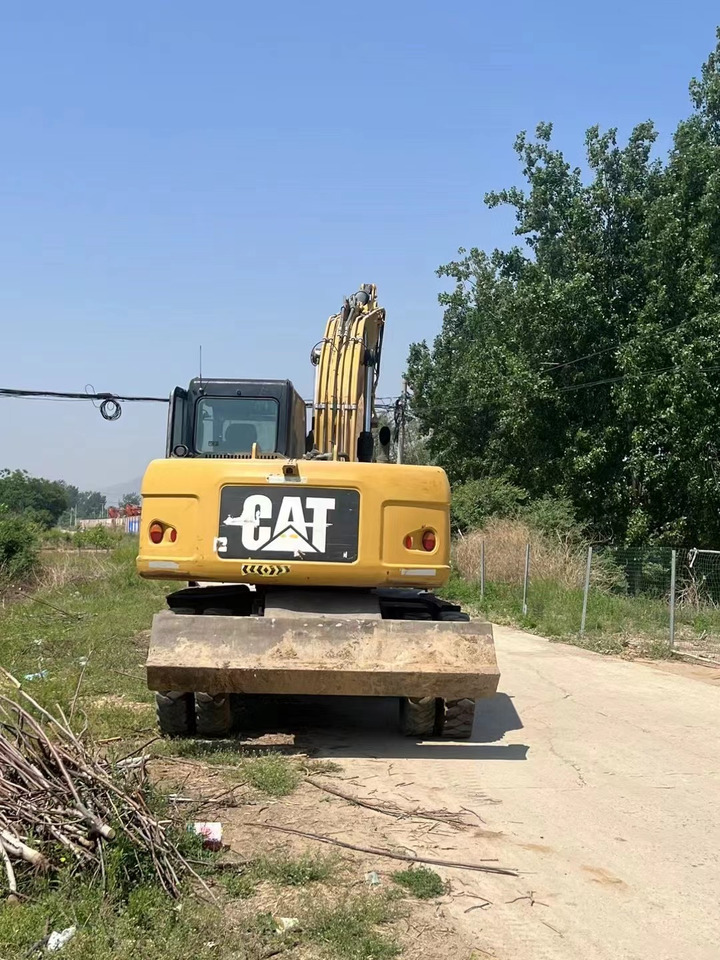 CATERPILLAR M317 - Pelle sur pneus: photos 3 CATERPILLAR M317 - Pelle sur pneus: photos 3