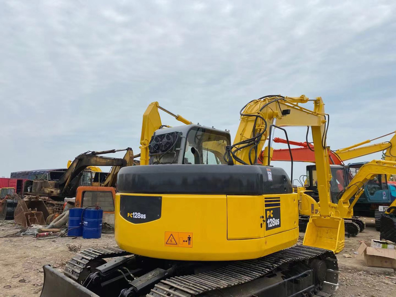 KOMATSU PC128US - Pelle sur chenille: photos 2 KOMATSU PC128US - Pelle sur chenille: photos 2