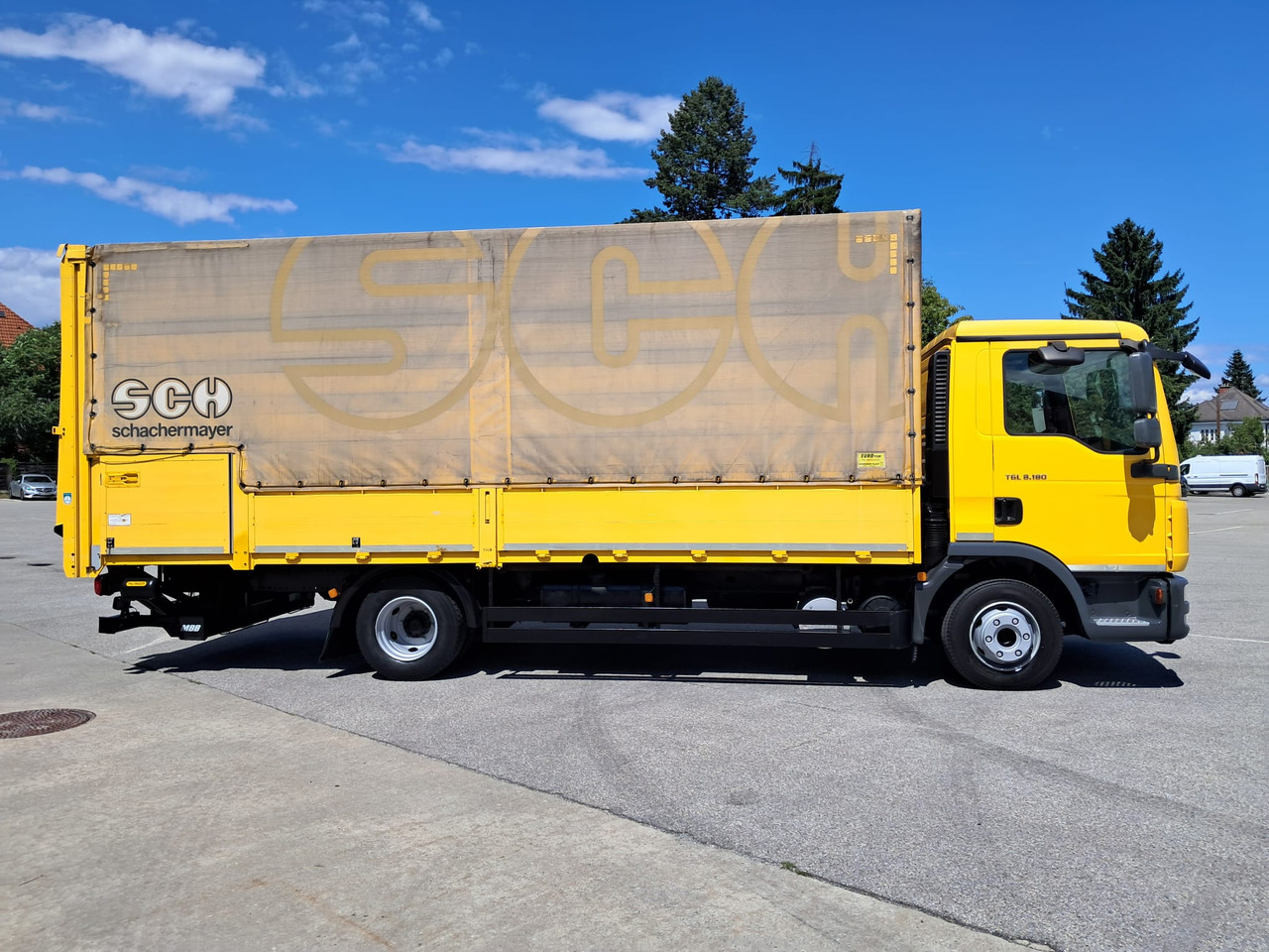 MAN MAN TGL 8.180 Pritsche + LBW | Klima | Tempomat | Schaltgetriebe - Camion plateau: photos 3 MAN MAN TGL 8.180 Pritsche + LBW | Klima | Tempomat | Schaltgetriebe - Camion plateau: photos 3