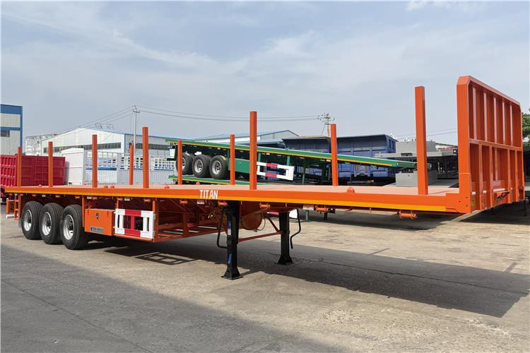 TITAN Container Flatbed Truck Trailer with Piles In Angola - Semi-remorque porte-conteneur/ Caisse mobile: photos 1 TITAN Container Flatbed Truck Trailer with Piles In Angola - Semi-remorque porte-conteneur/ Caisse mobile: photos 1