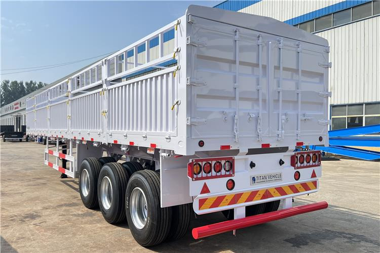 TITAN Tri Axle 60 Ton Fence Cargo Semi Trailer for Sale In Guinea - Semi-remorque bétaillère: photos 5 TITAN Tri Axle 60 Ton Fence Cargo Semi Trailer for Sale In Guinea - Semi-remorque bétaillère: photos 5